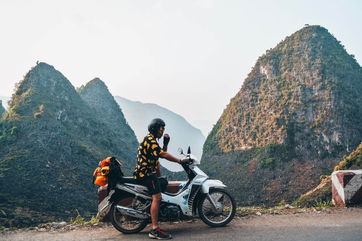Motorbikers riding along Ha Giang’s winding mountain roads